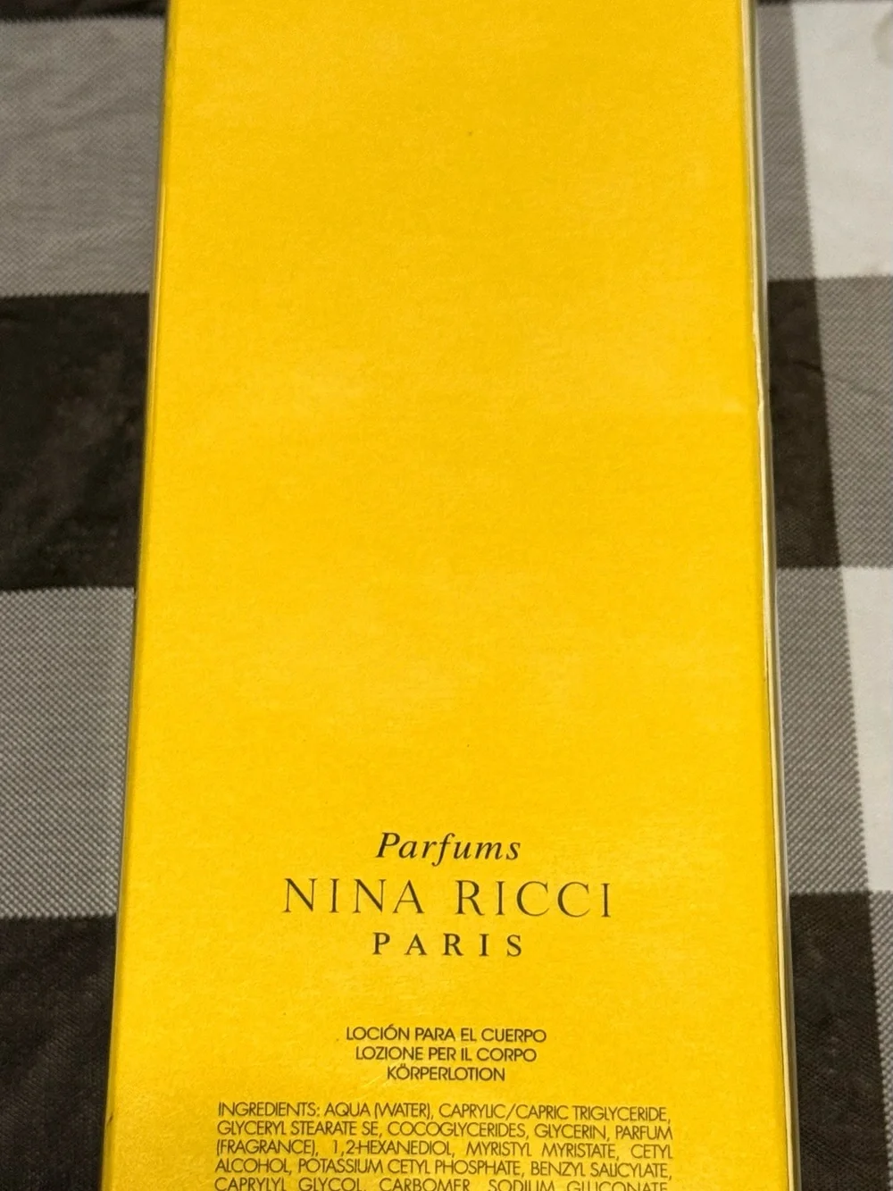 Nina Ricci Yellow Packaging Body Lotion Box